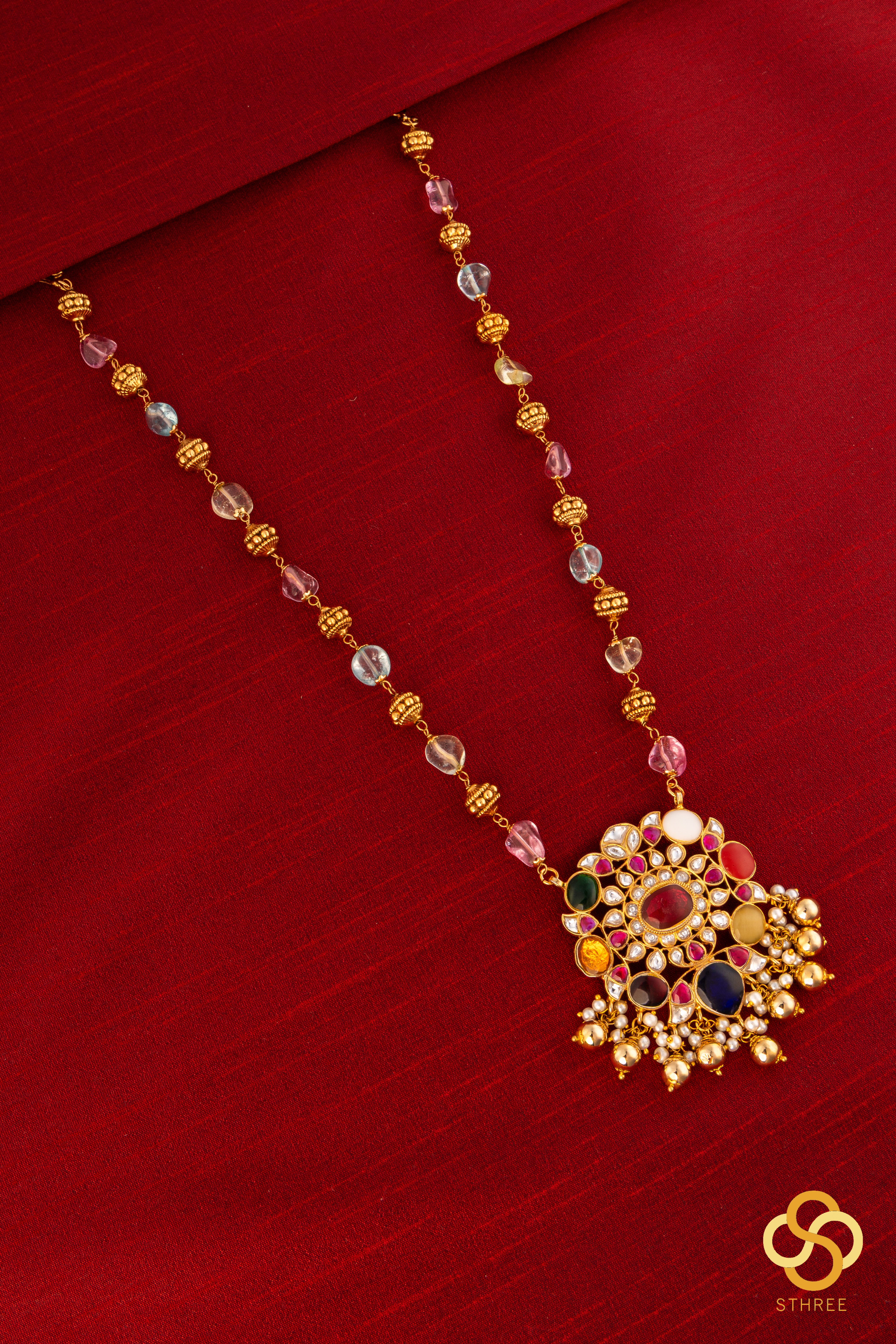 Navarathna pendant in Gold ball and Multi colour stone