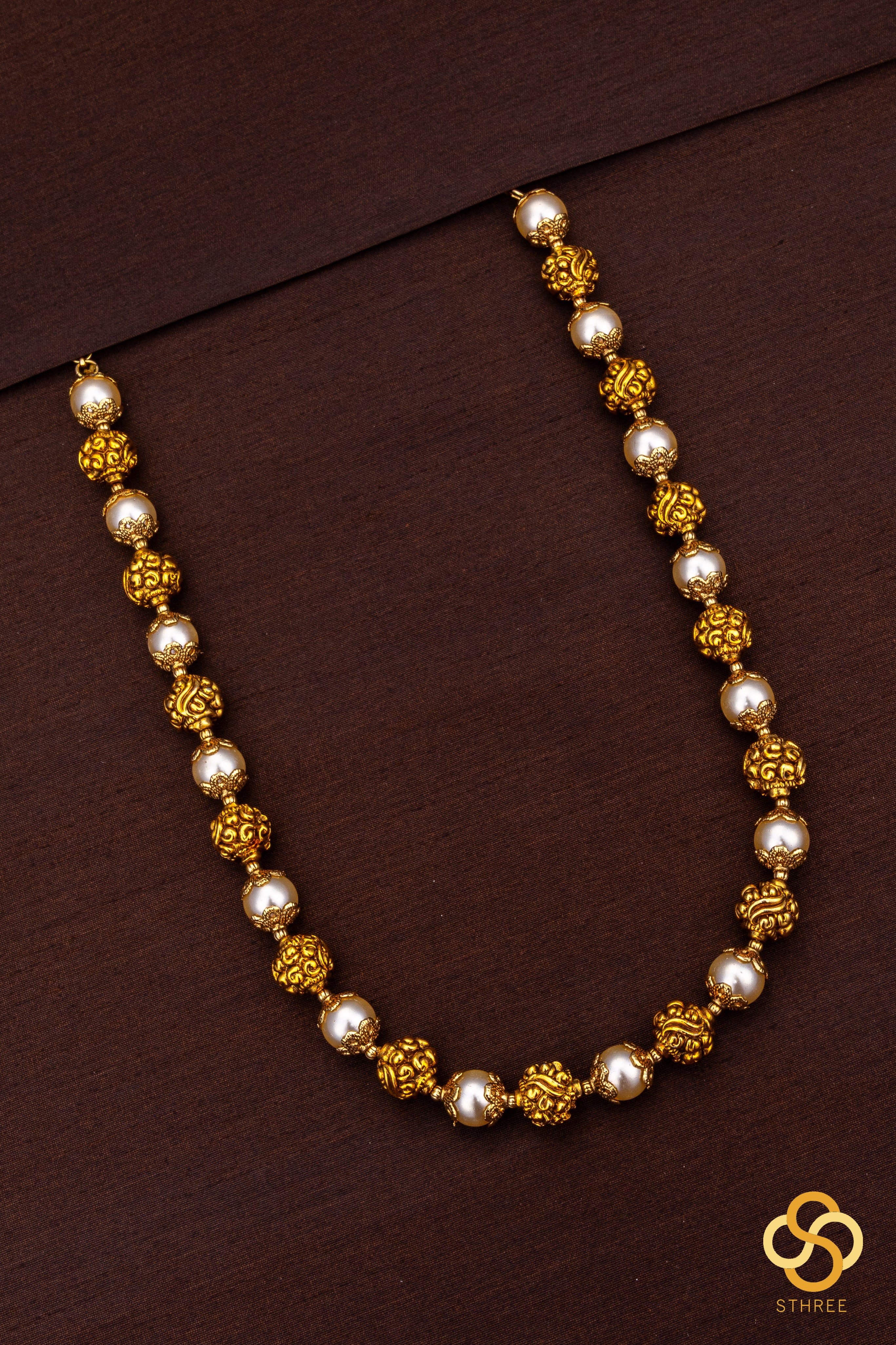Pearls with gold balls set