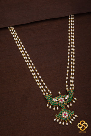 Three liner pearls with Emerald green pendant