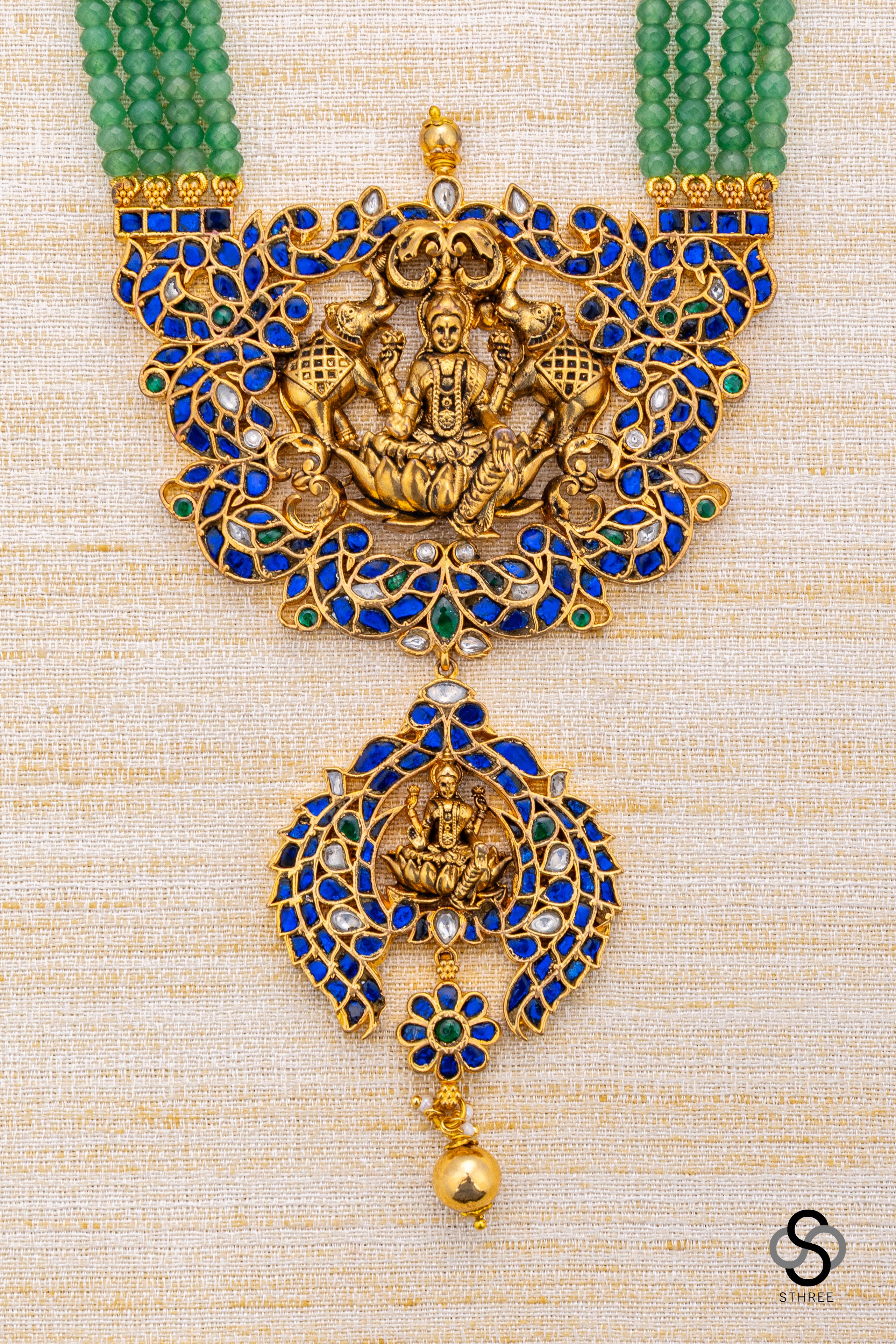 Four liner green beads with lakshmi Pendant - Sapphire blue