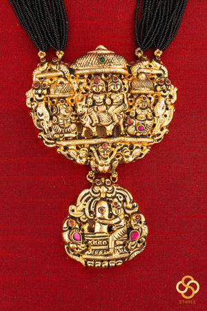 A bunch of black cut-beads strands - The Gowri Shankaram pendant