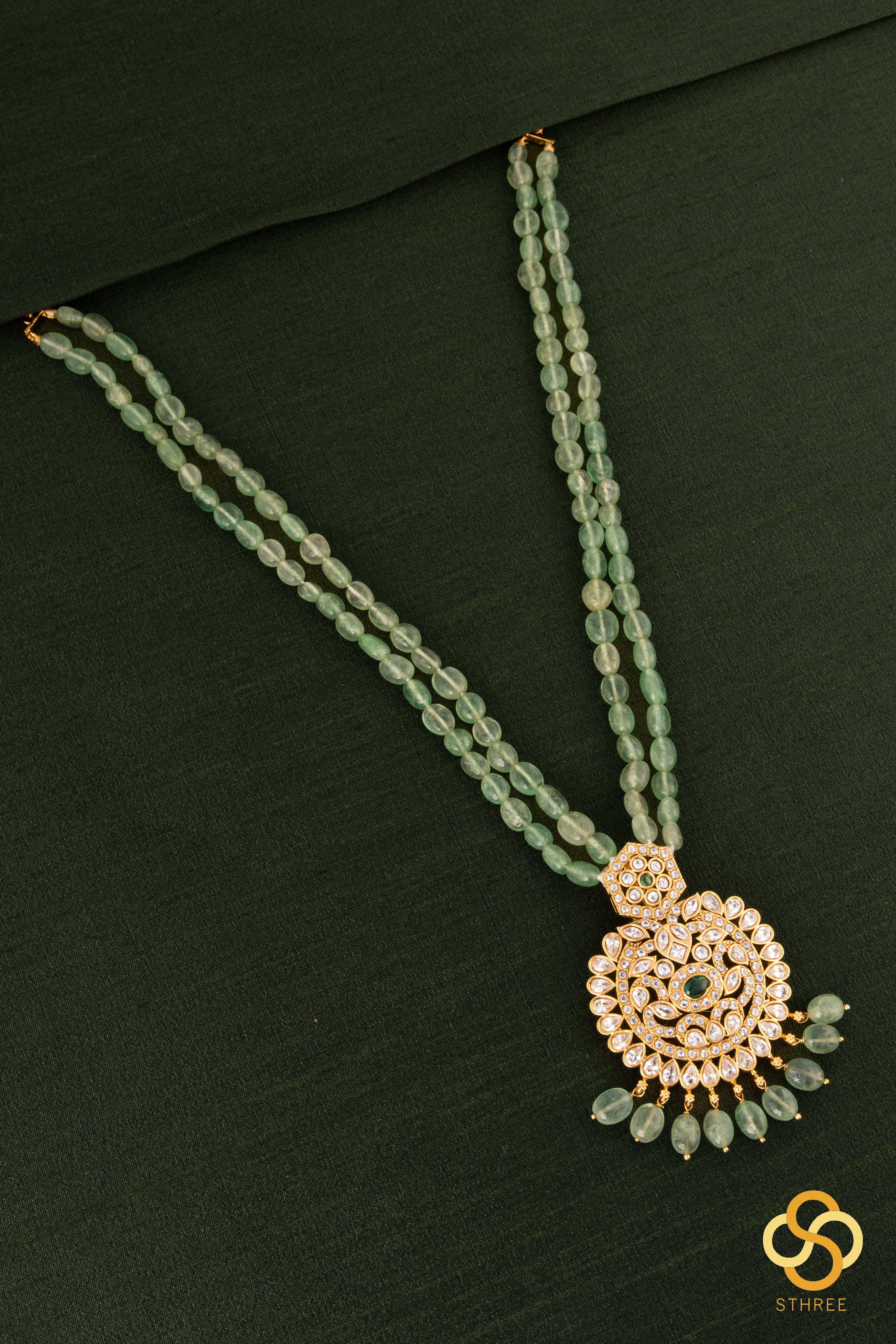 Jadau kundan necklace with two line green beads