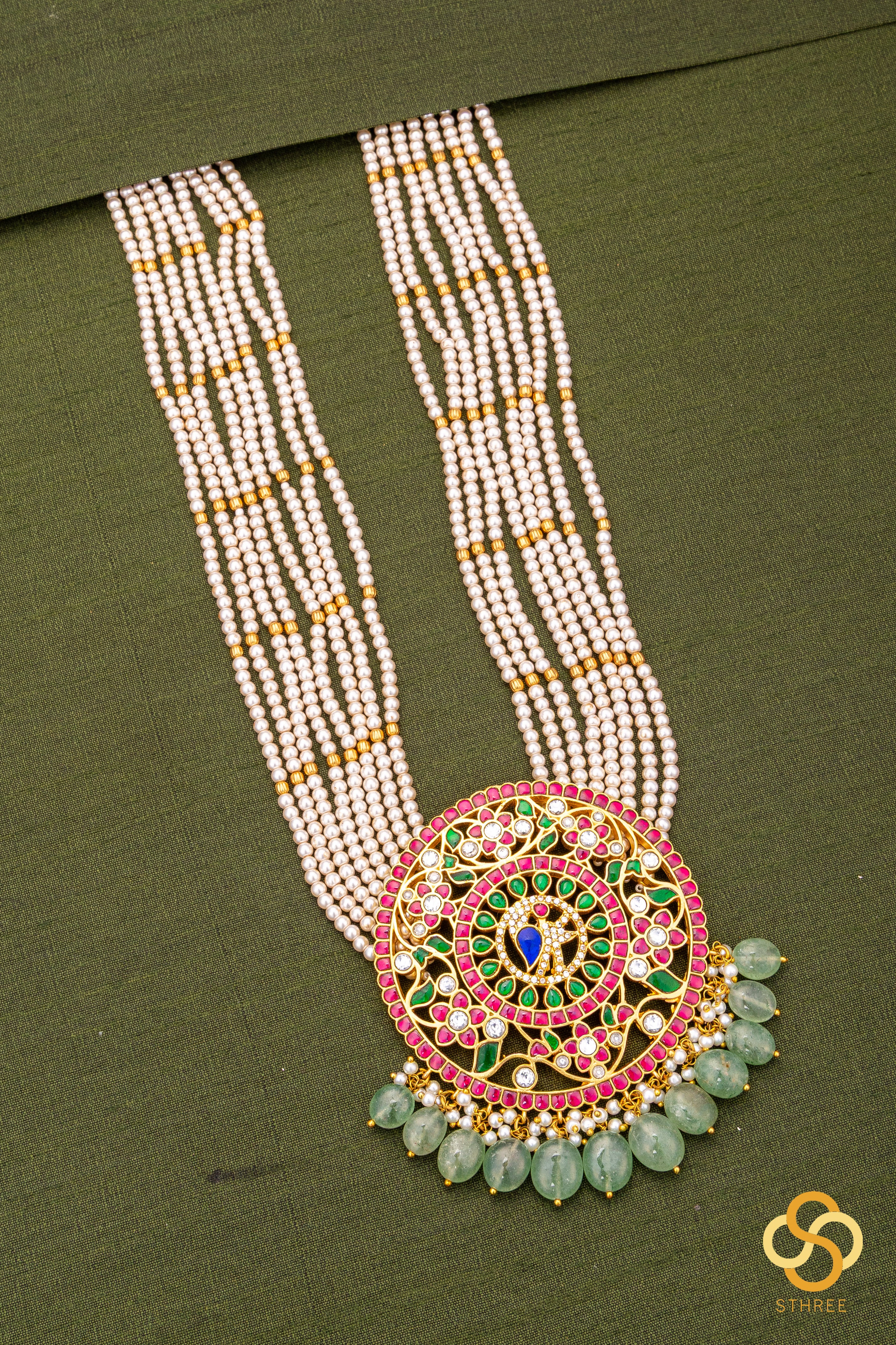 Rakkodi in eight strands of pearls