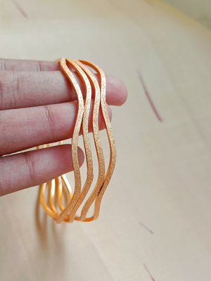 Matt Gold wave bangle