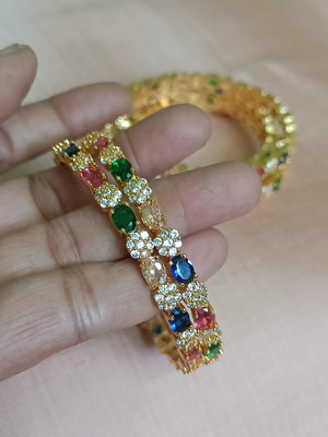 Seven stone diamond setting with multi colour stones