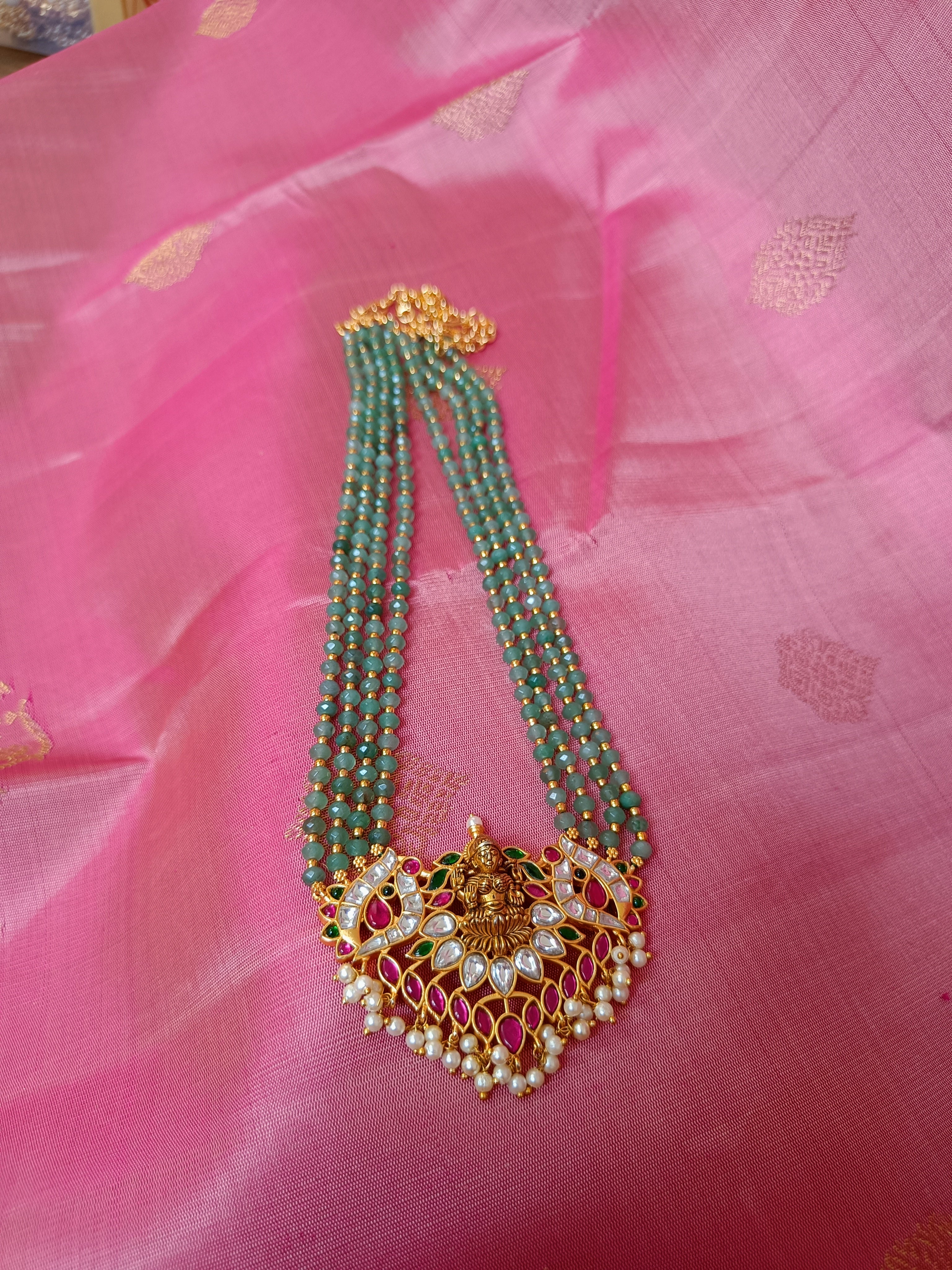 Lakshmi kundan set in green beads