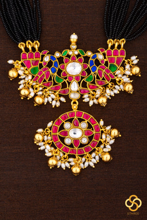 A bunch of black cut-beads strands - Mayurakanthi haram -Ruby red