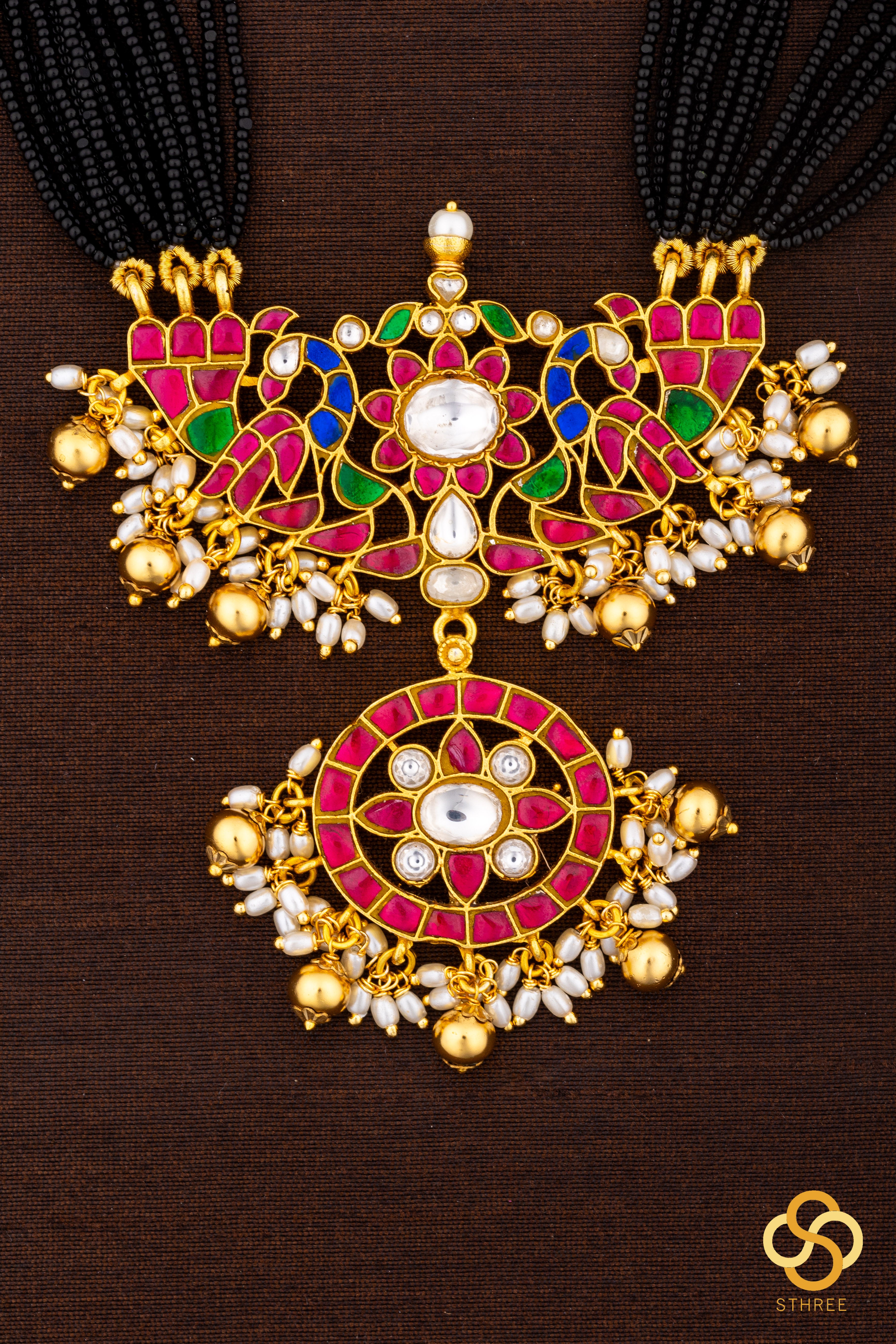 A bunch of black cut-beads strands - Mayurakanthi haram -Ruby red