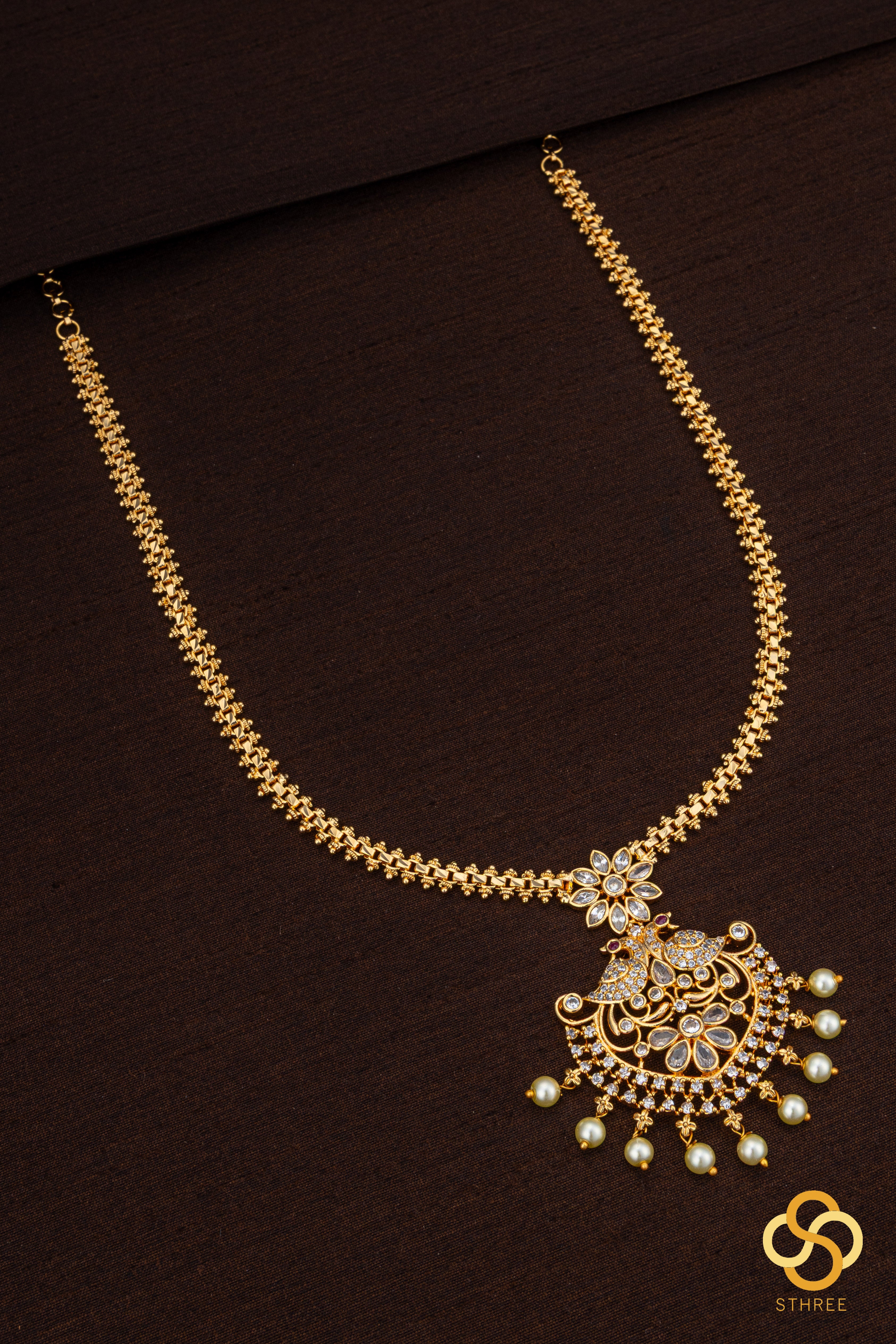 Peacock neckpiece with pearls