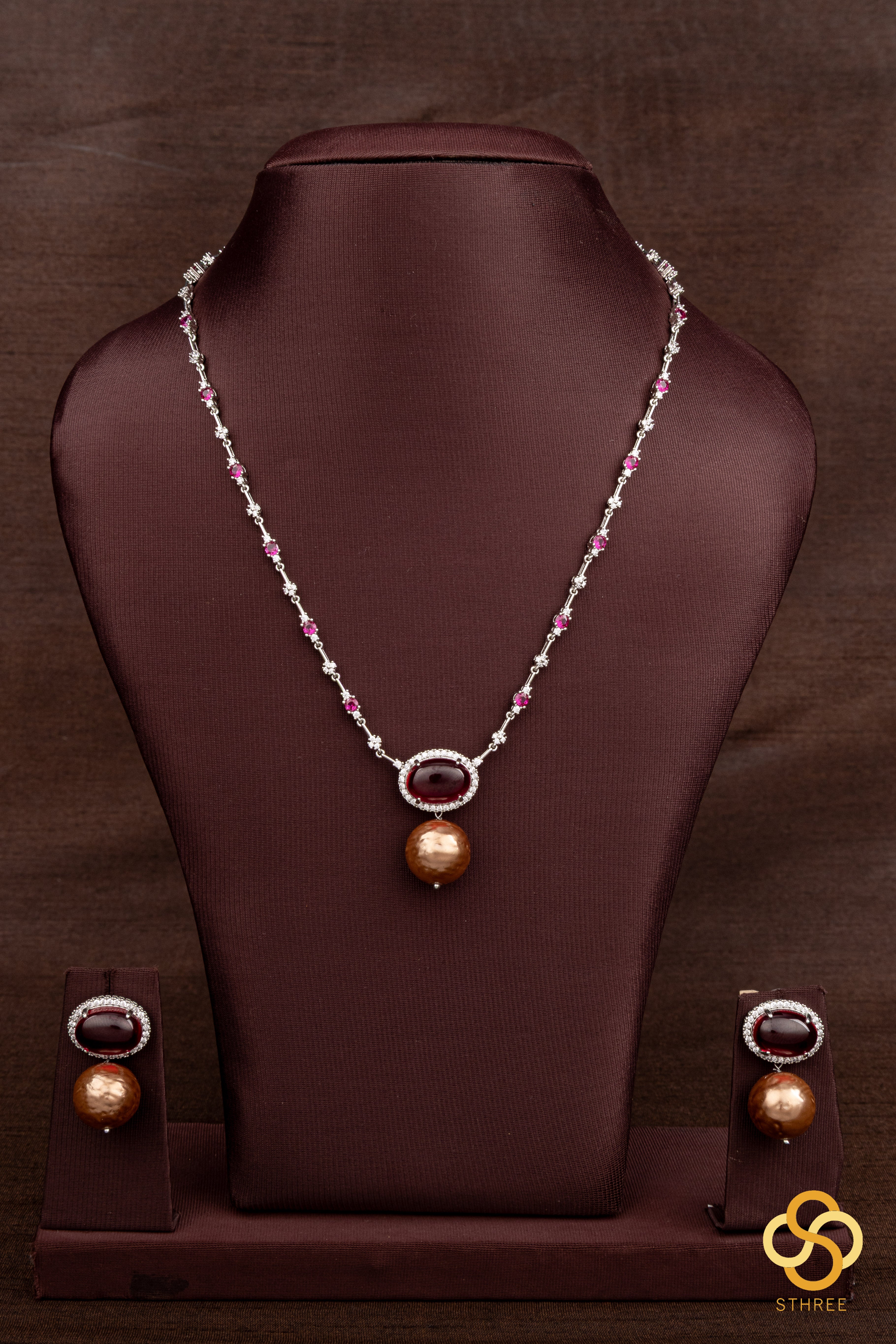 Zircon and ruby necklace set, with pearl hanging