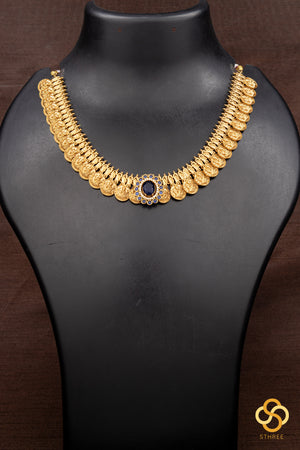 Lakshmi kasumalai with a sapphire blue  mogappu
