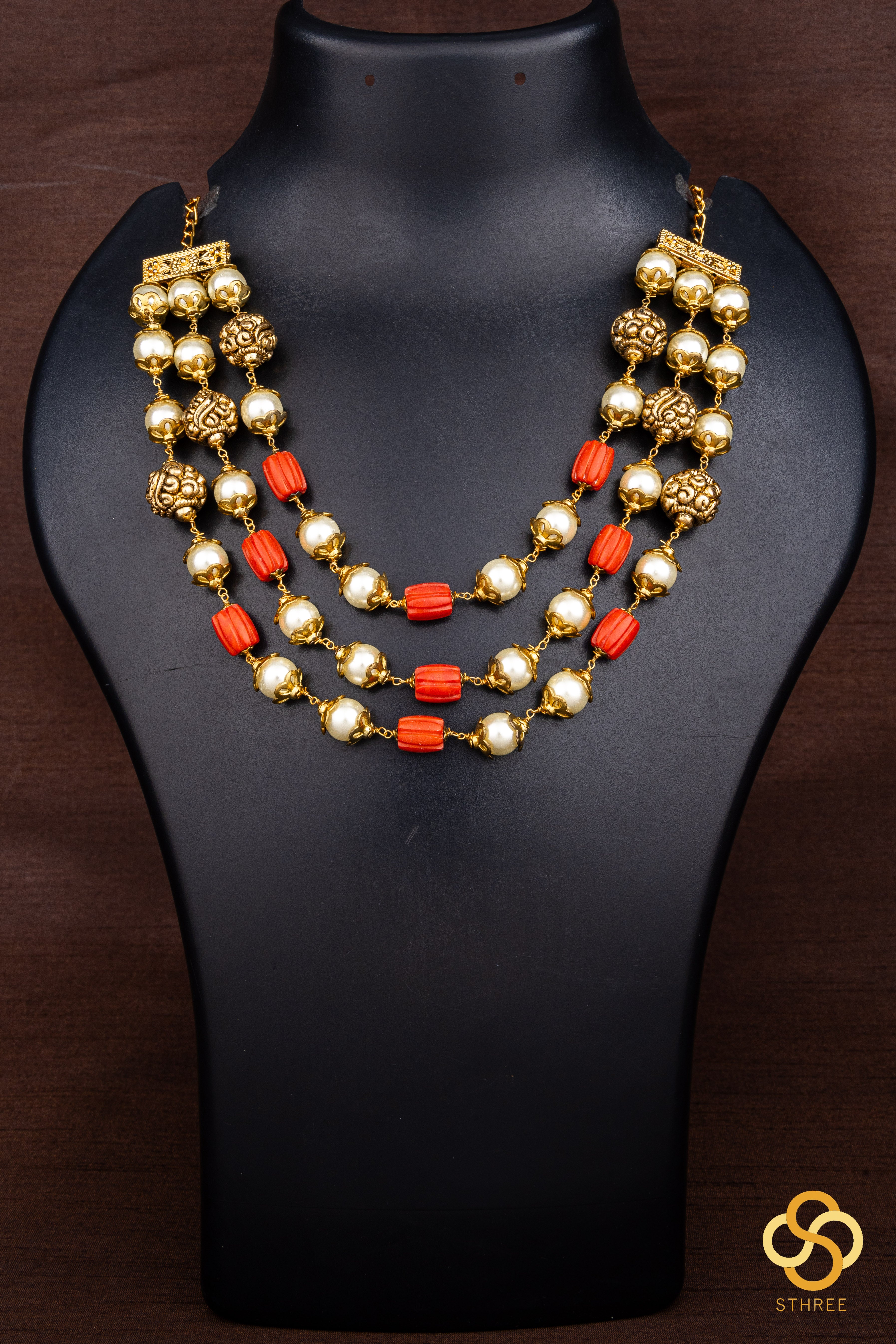 Three liner - Carved coral, pearls and gold balls
