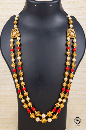 Two liner gold balls with pearls and coral