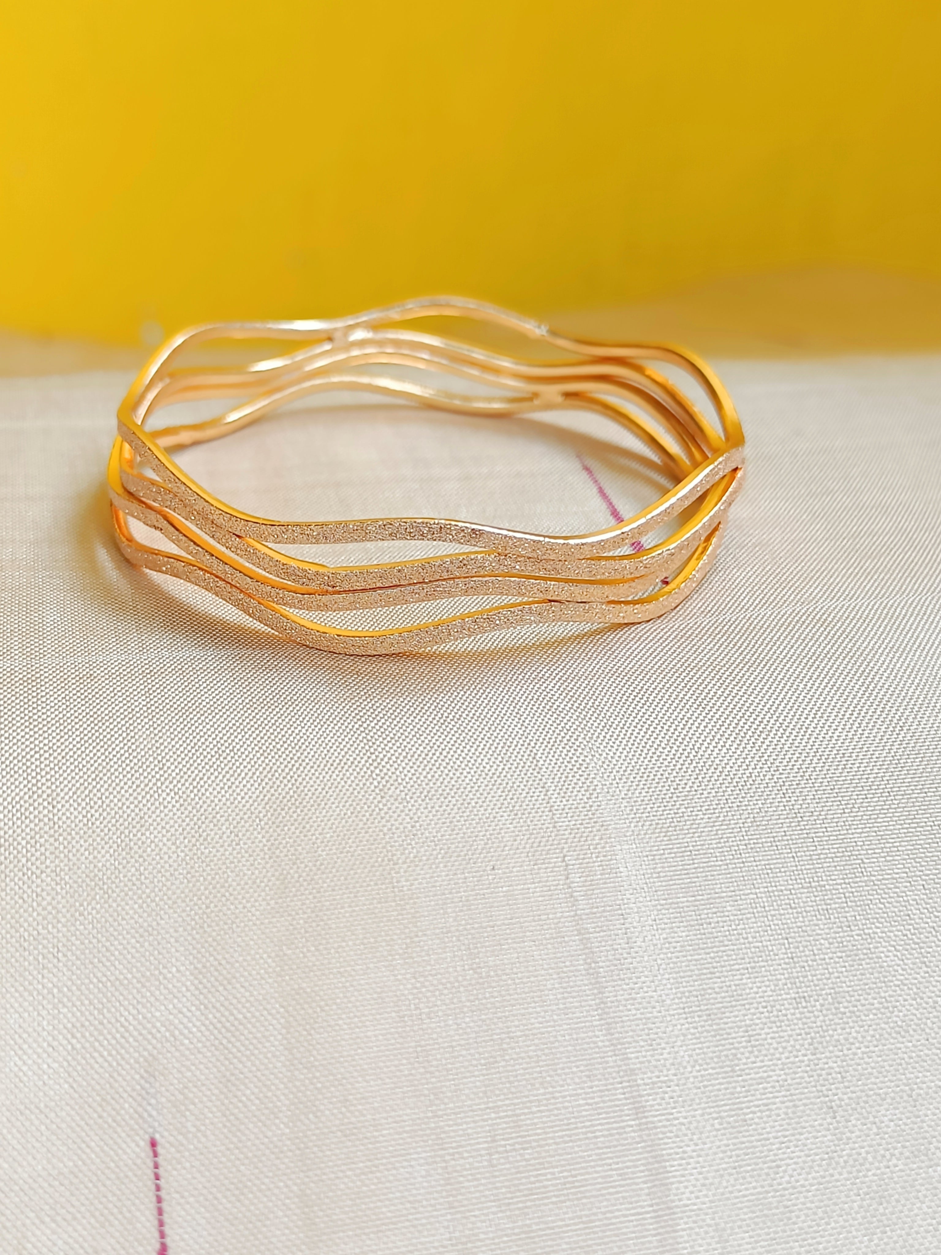 Matt Gold wave bangle