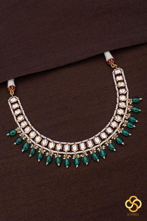 Kundan with pearls and green beads hangings