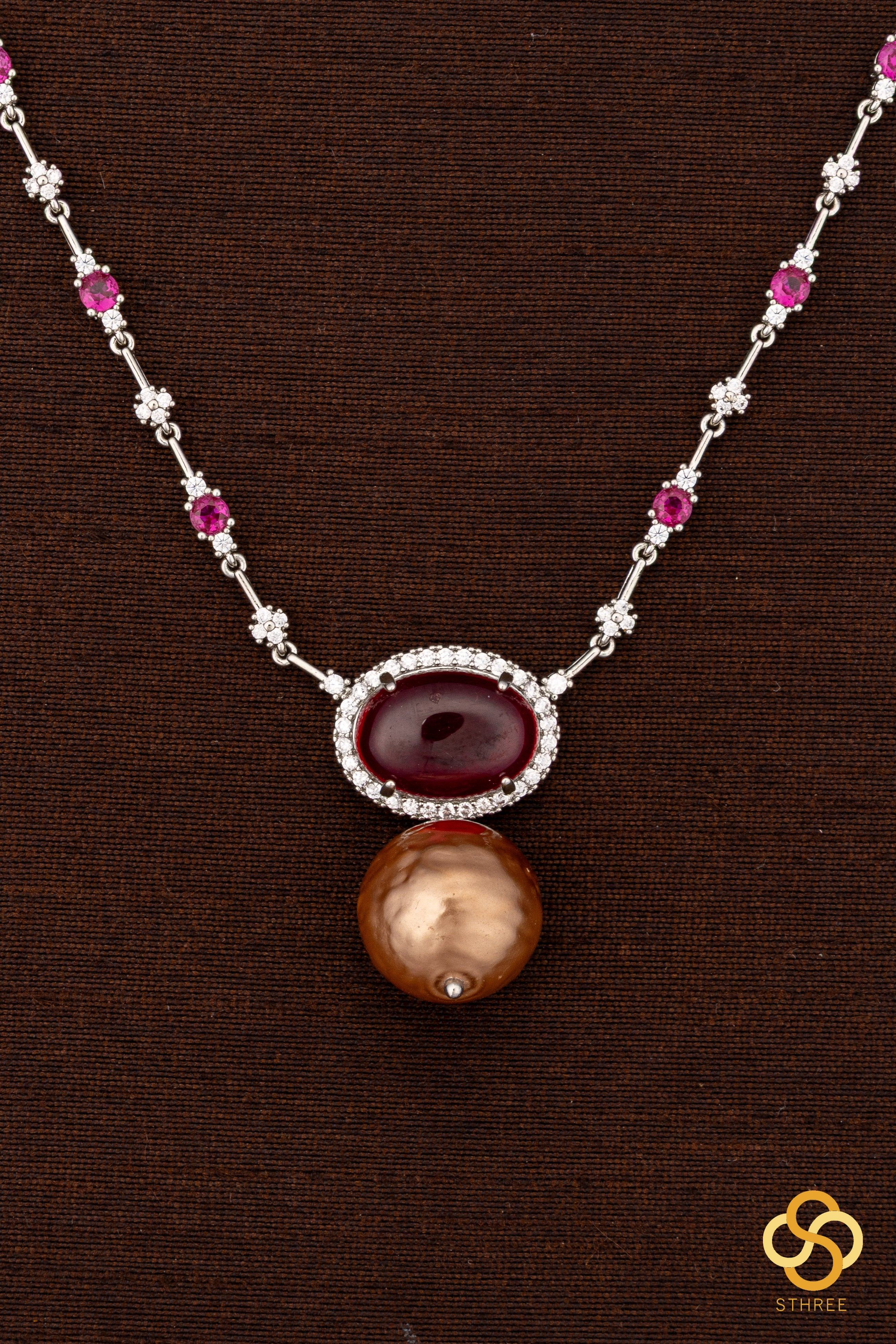 Zircon and ruby necklace set, with pearl hanging