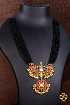 A bunch of black cut-beads strands - Mayurakanthi haram -Ruby red