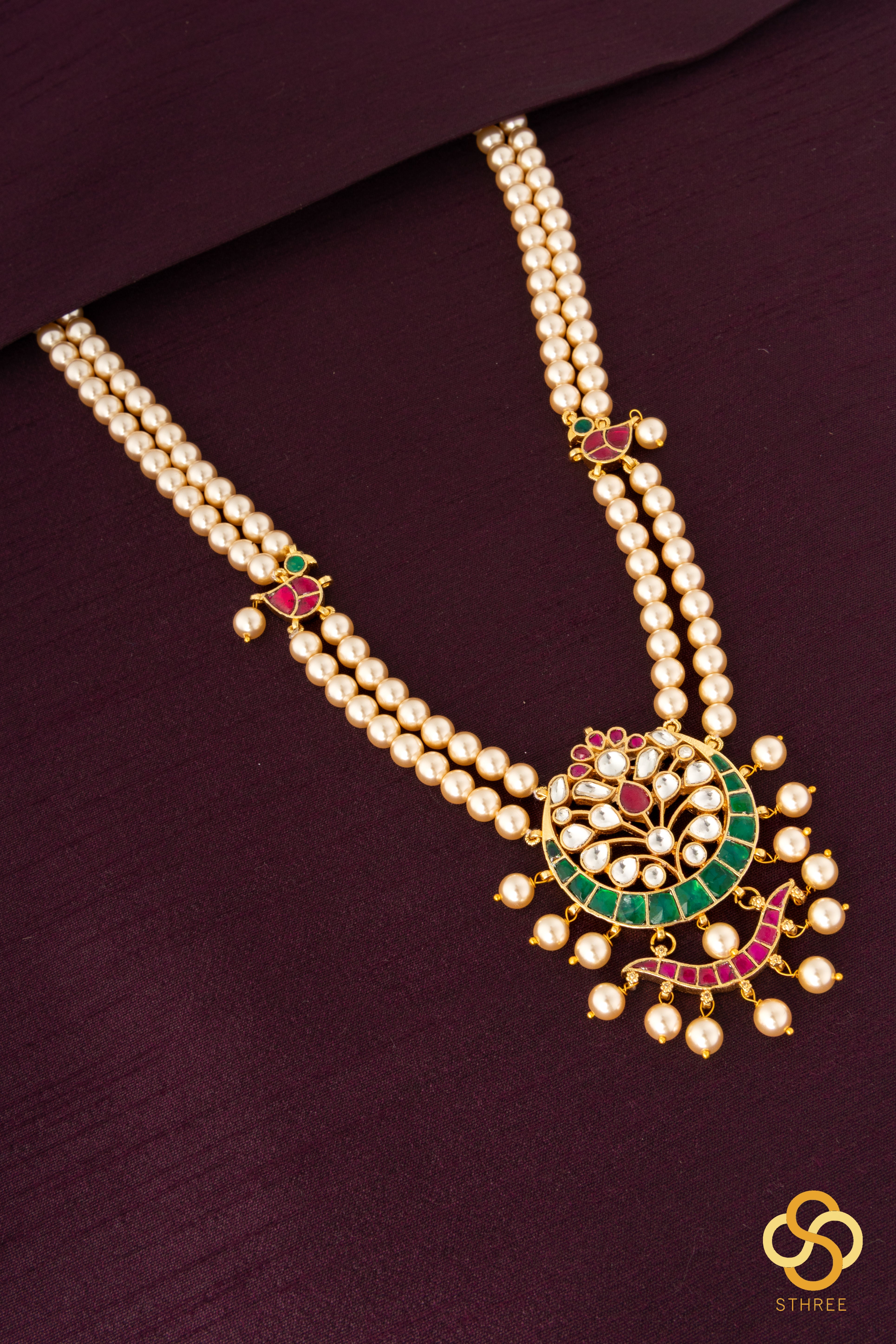 Swarovski two-liner pearls with a chandbali pendant - Emerald green