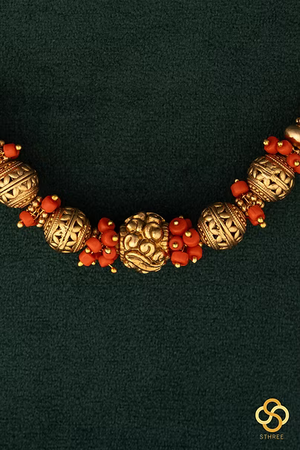 Coral beads with Gold ball