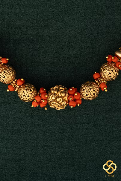 Coral beads with Gold ball