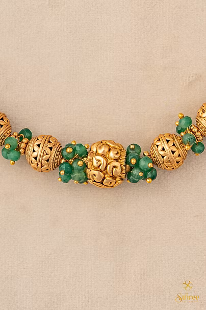 Green beads with Gold ball