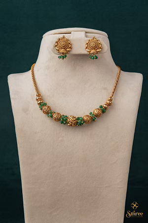 Green beads with Gold ball
