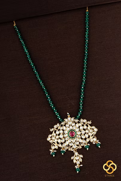 Green beads with kundan pendant