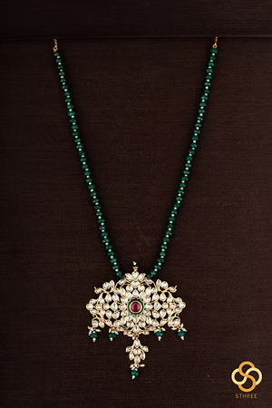 Green beads with kundan pendant