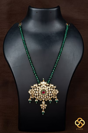 Green beads with kundan pendant