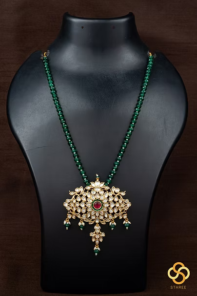 Green beads with kundan pendant