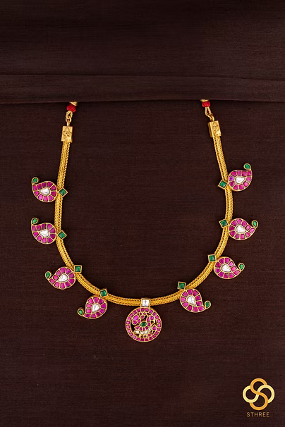 Kemp addigai with mango pendants